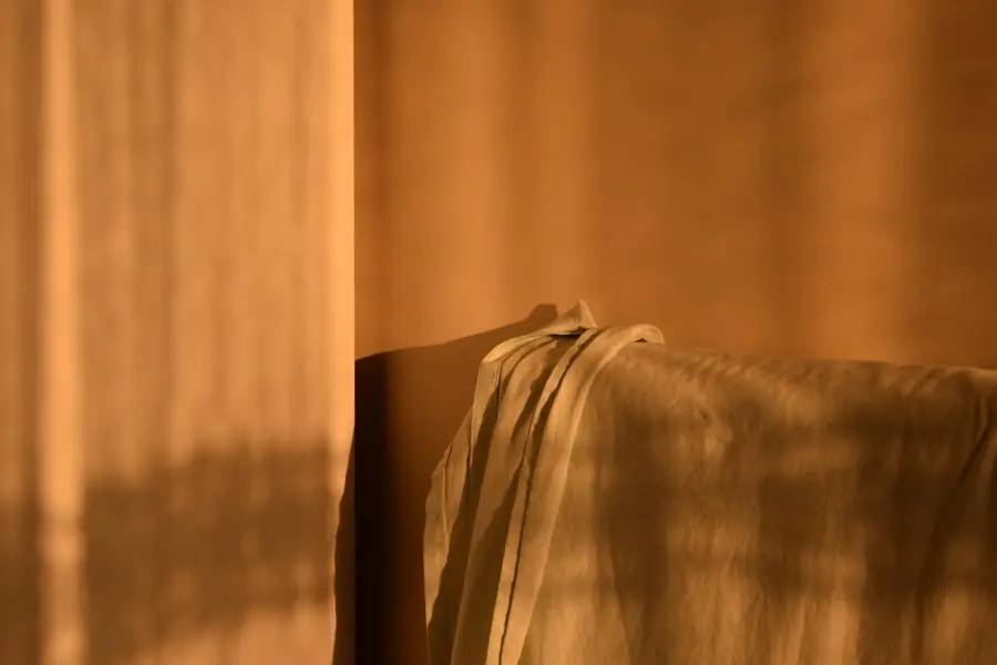 Warm light through a linen curtain